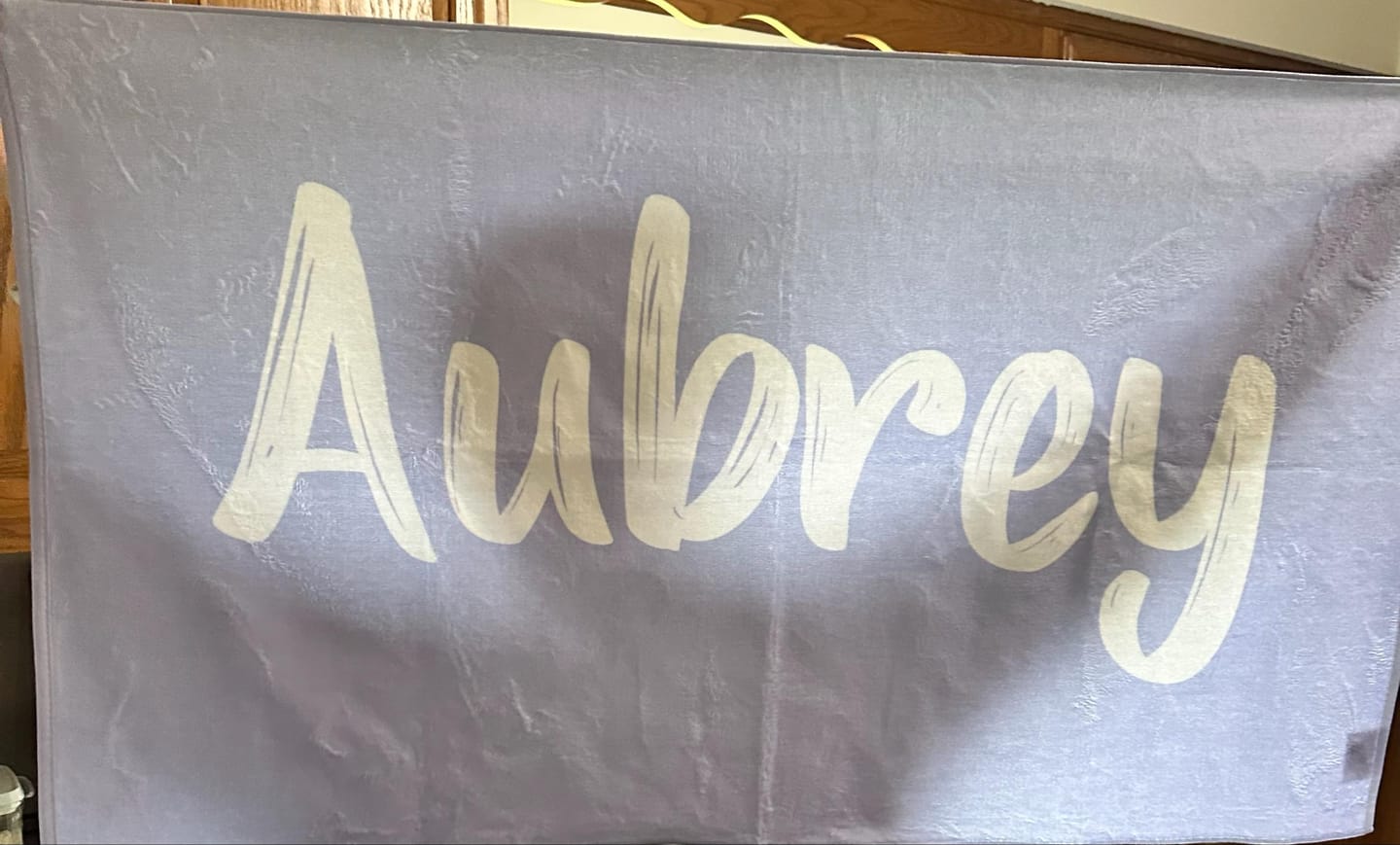 Customer photo review of Personalized Beach Towel: Bold Font Custom Name, Vacation Gift