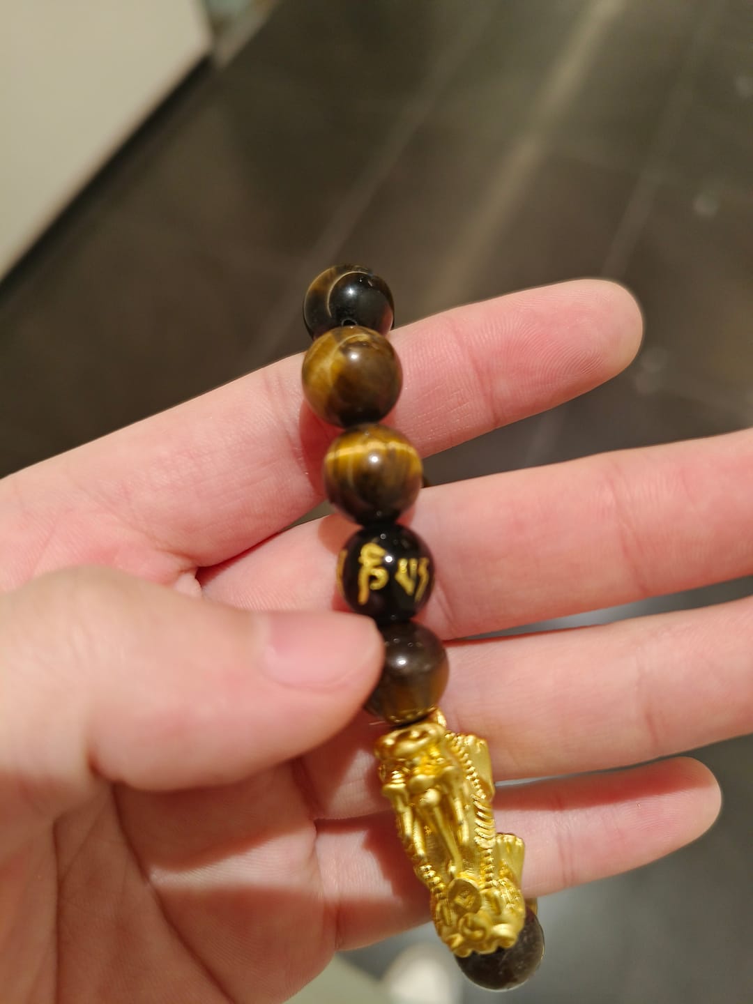 Customer photo review of FREE Today: Protection Confidence & Wealth Tiger Eye Pixiu Crystal Healing Bracelet For Men