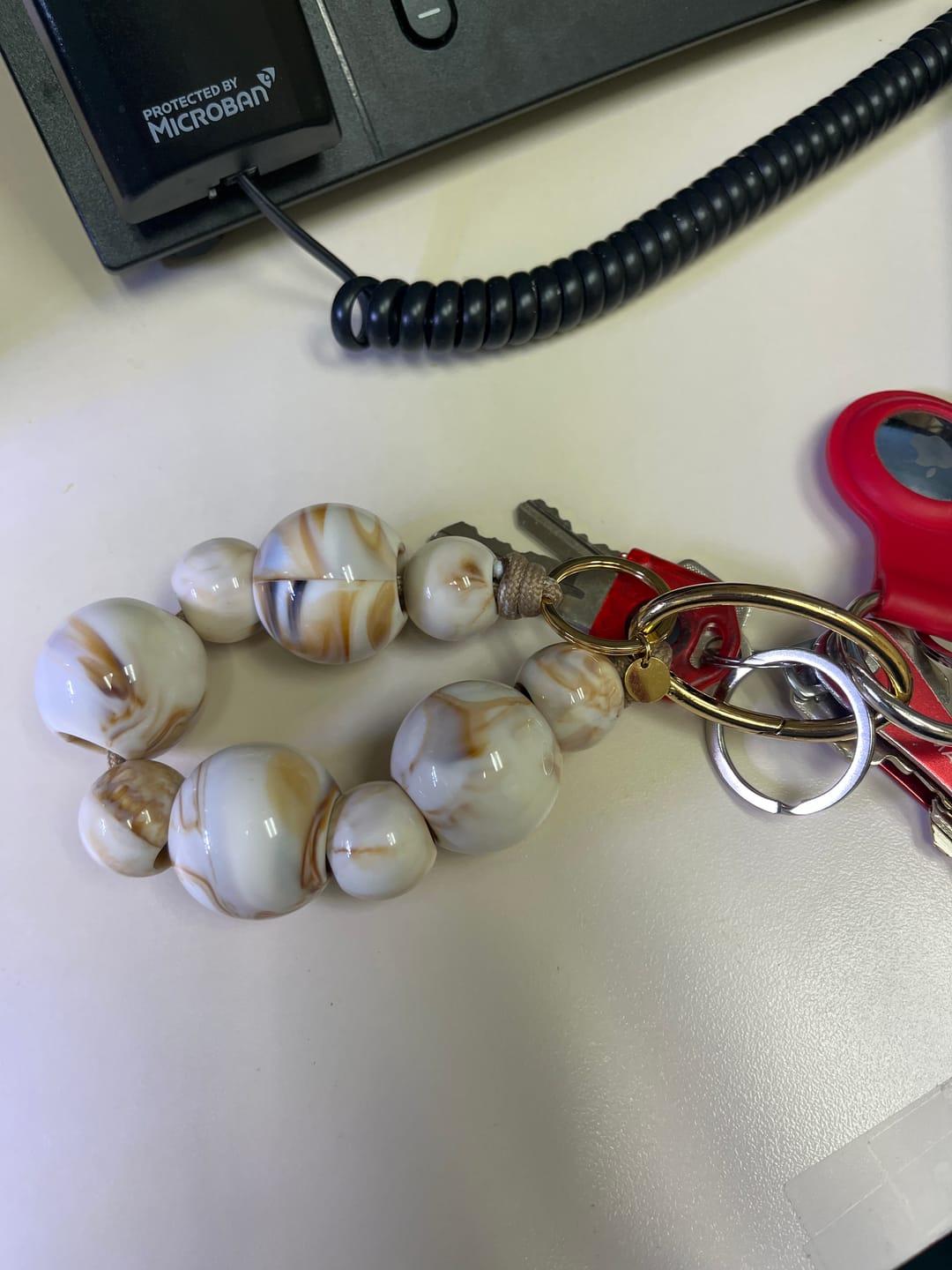 Customer photo review of RIVIERA Beige Keychain