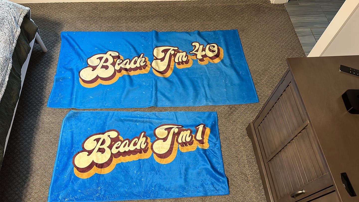 Customer photo review of Personalized Retro Beach Towel: Custom Name, 50% Cotton, 30x60