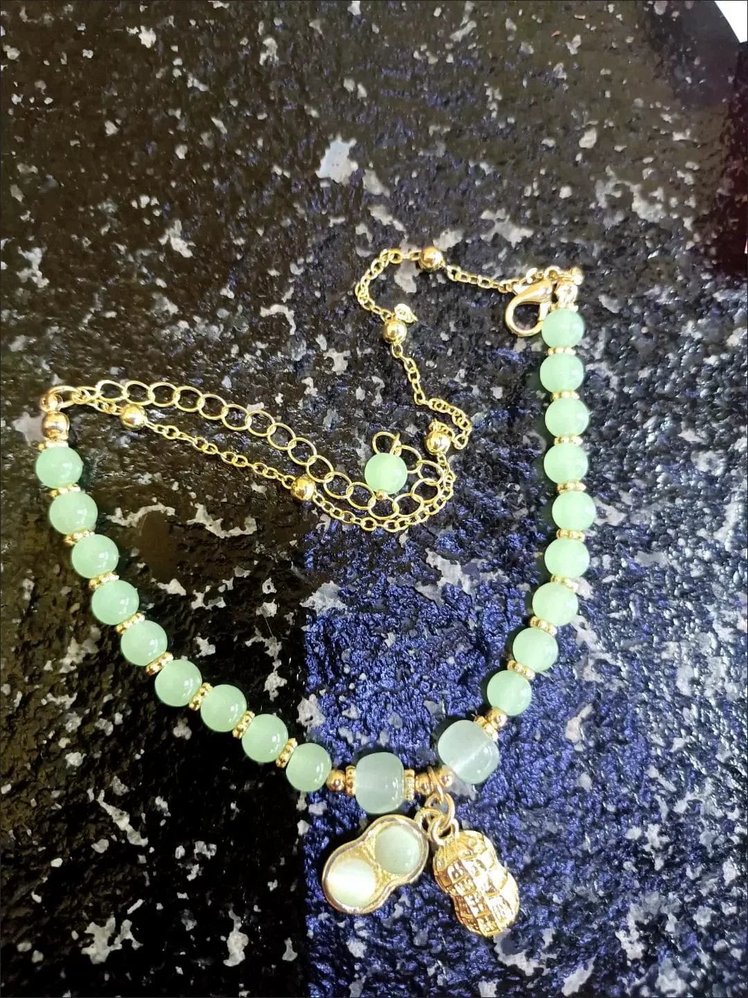 Customer photo review of FuAttract Good Fortune & Prosperity Hetian Jade Peanut Charm Double Layer Luck Bracelet