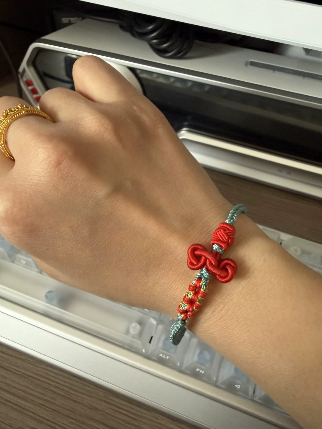 Customer photo review of FuAttract Good Luck Wisdom & Success Wenchang Knot Handmade Red String Bracelet