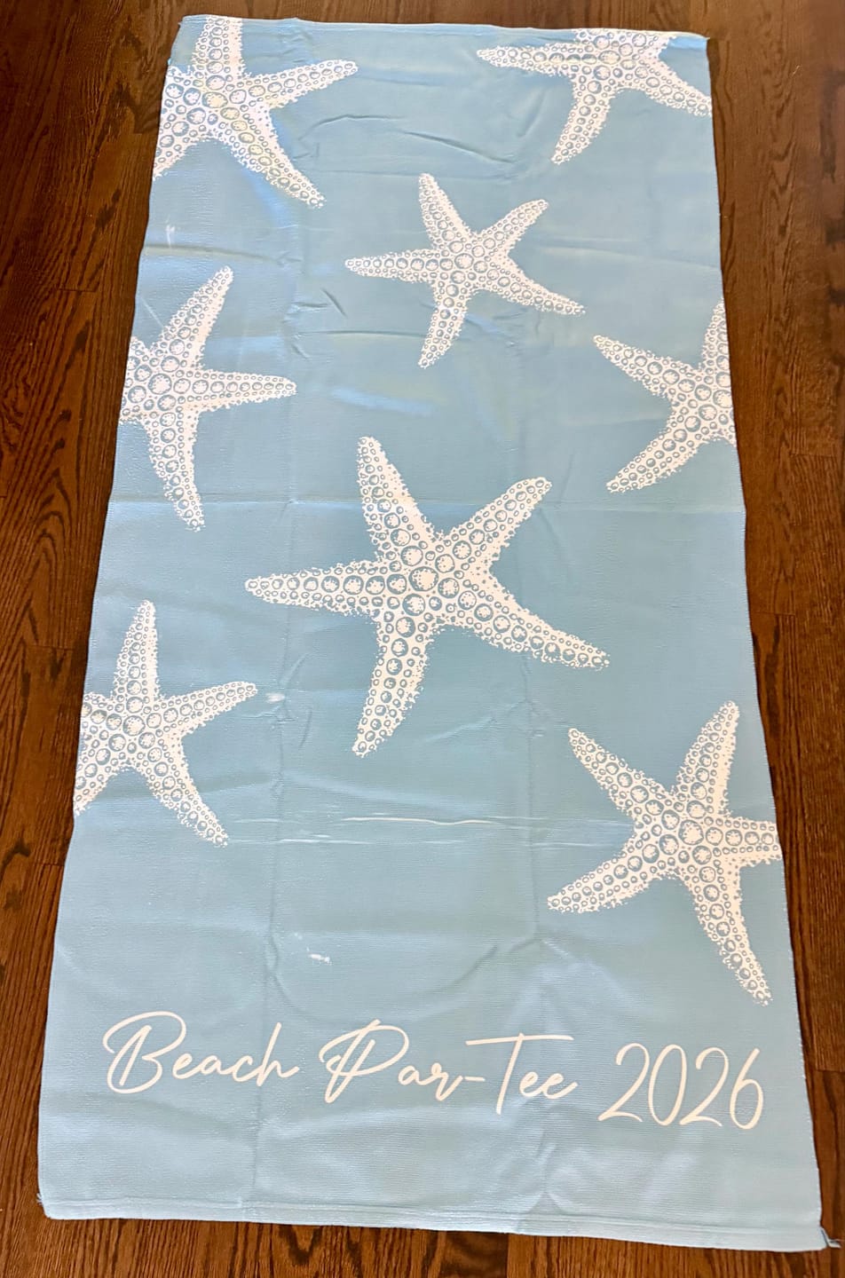 Customer photo review of Personalized Starfish Beach Towel: Custom Name, Vacation Gift