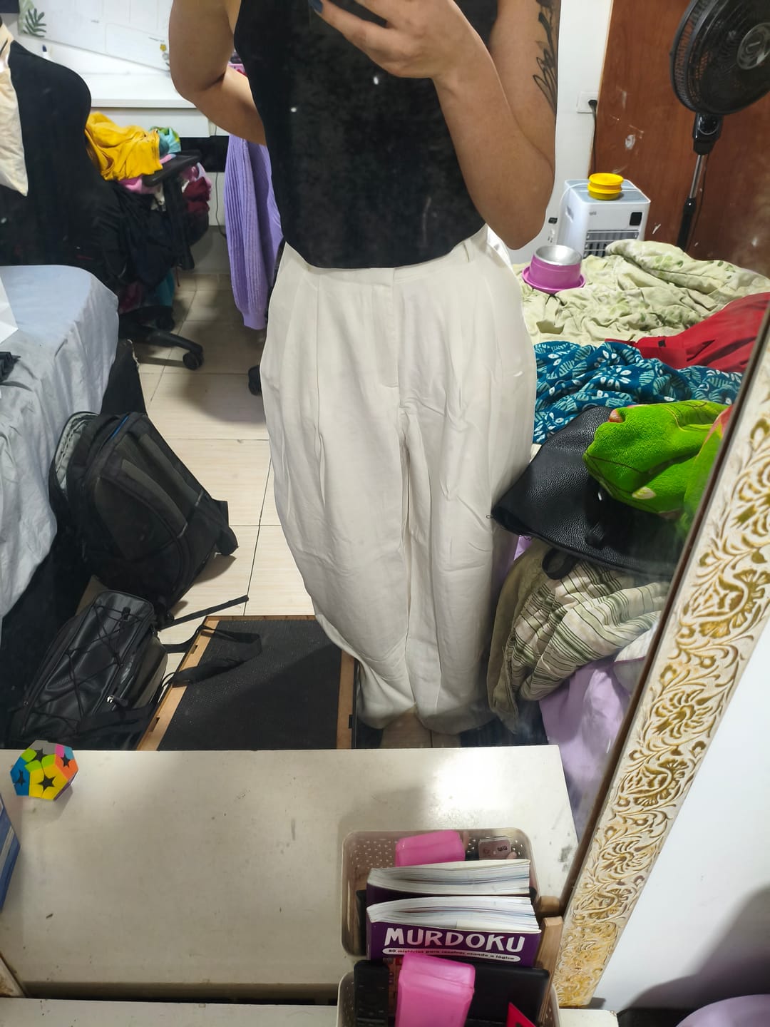 Customer photo review of Calça Pantalona Agave Off White + Forro