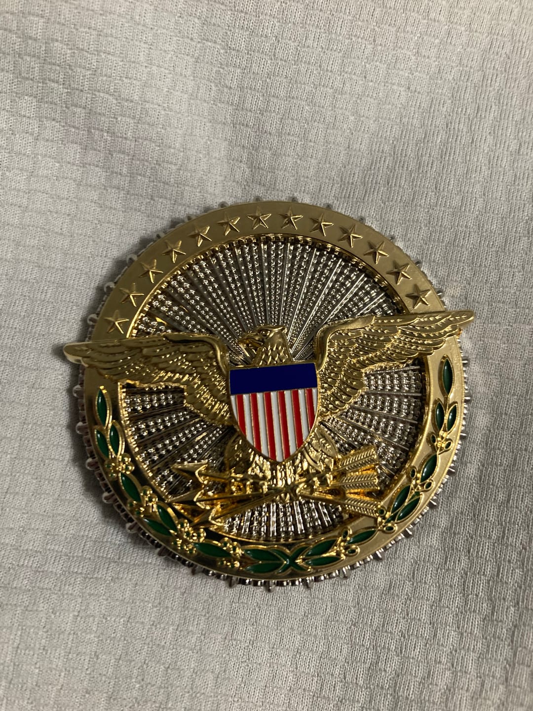 Customer photo review of US DOD Department of Defense Eagle Solid Copper Badge Replica Movie Props