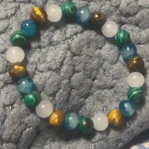 Customer photo review of FREE Today: Wealth Protection & Confidence Natural Tiger Eye Malachite Colorblock Beaded Bracelet