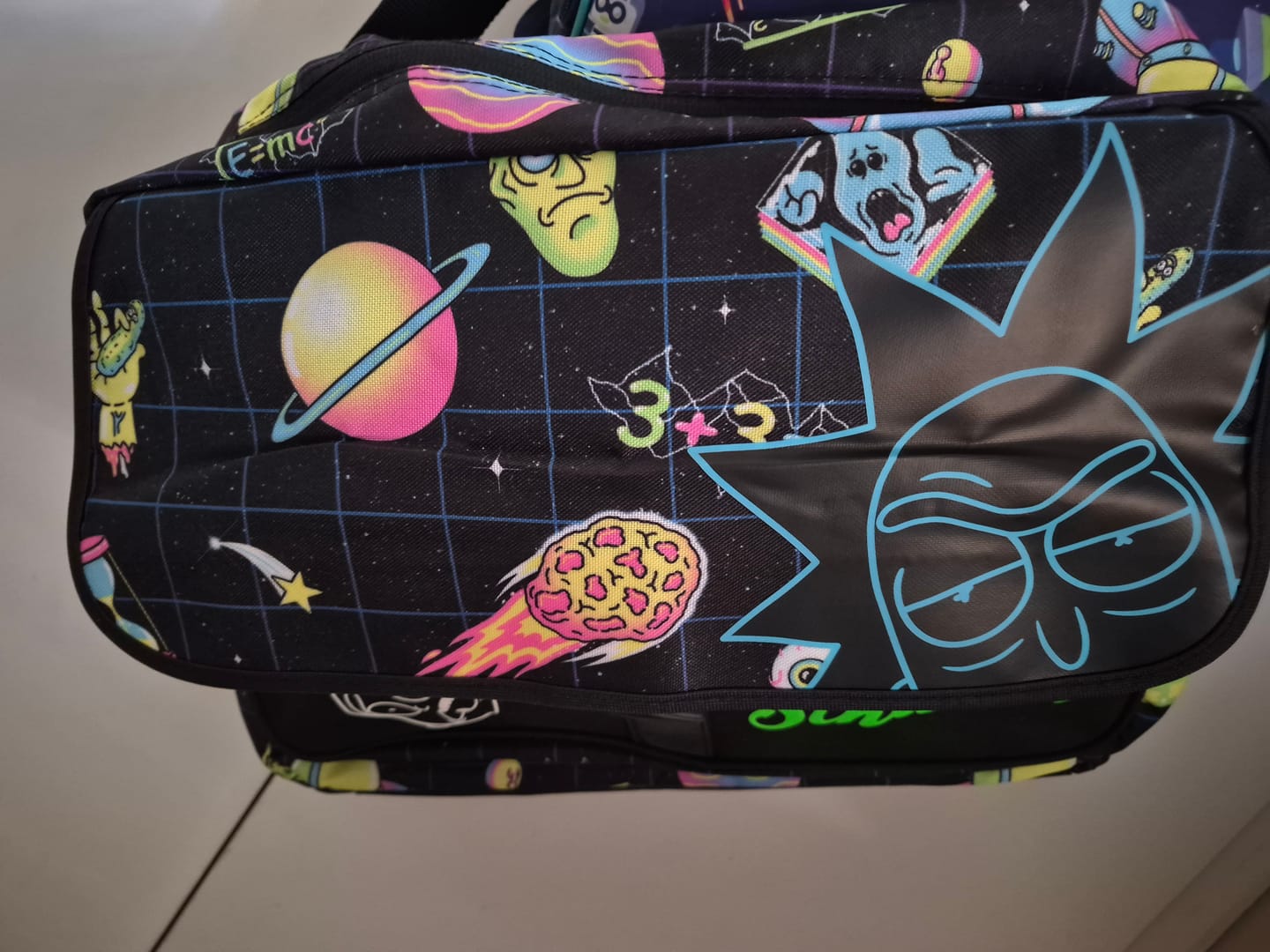 Customer photo review of Rick And Morty - Space AOP With Flock Print Messenger Bag