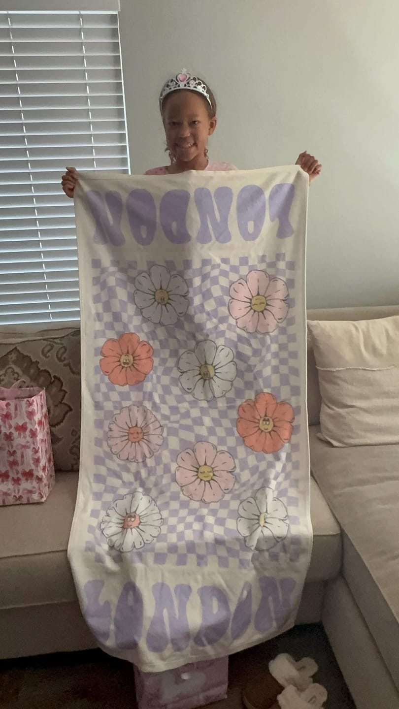 Customer photo review of Retro Floral Personalized Beach Towel: Custom Name Vacation Gift