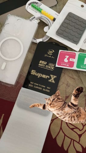 Customer's Casence Armor charging cable, screen protector, and protective accessories spread out on a patterned surface.
