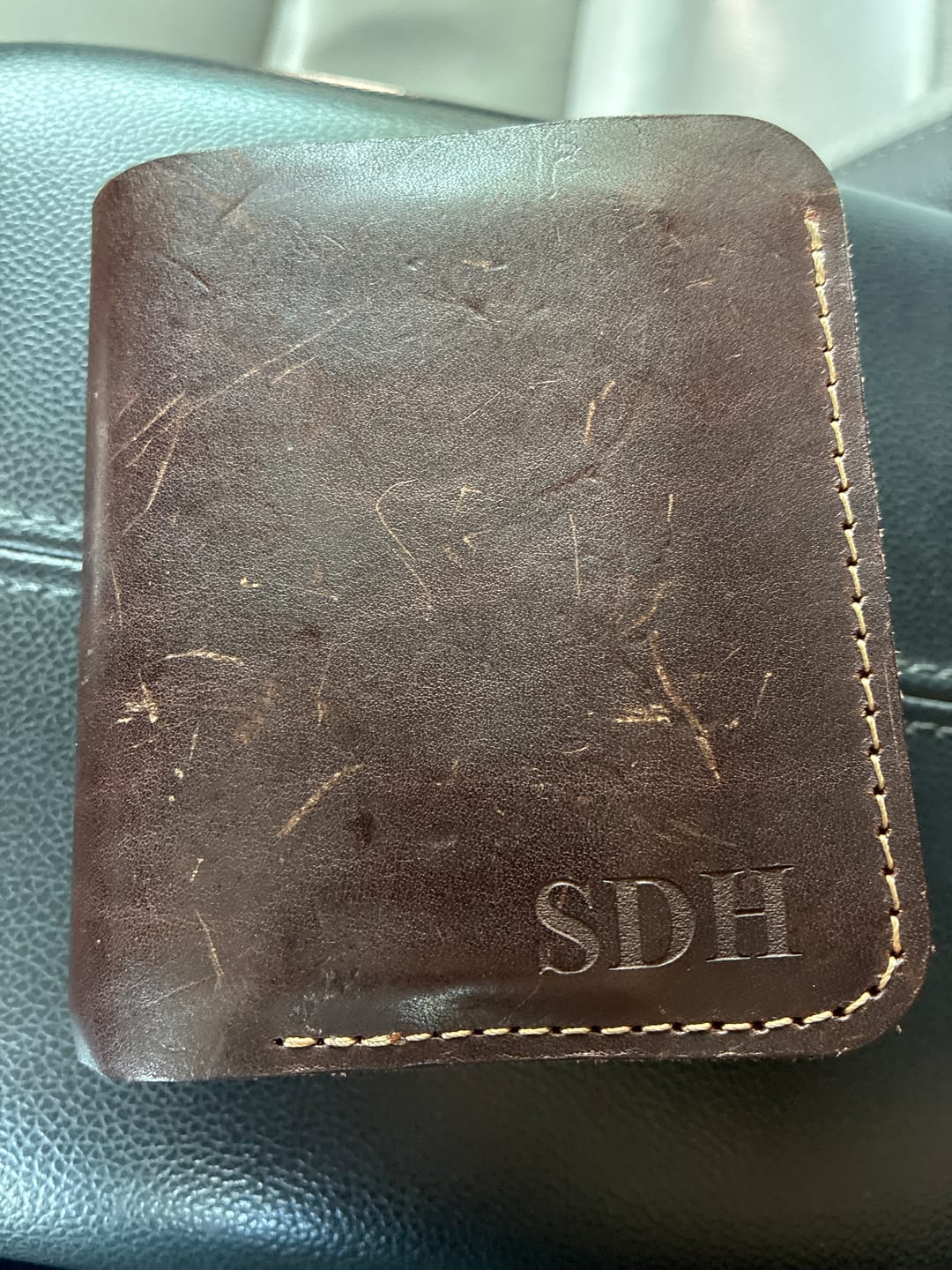 Customer photo review of Badge Trifold Wallet