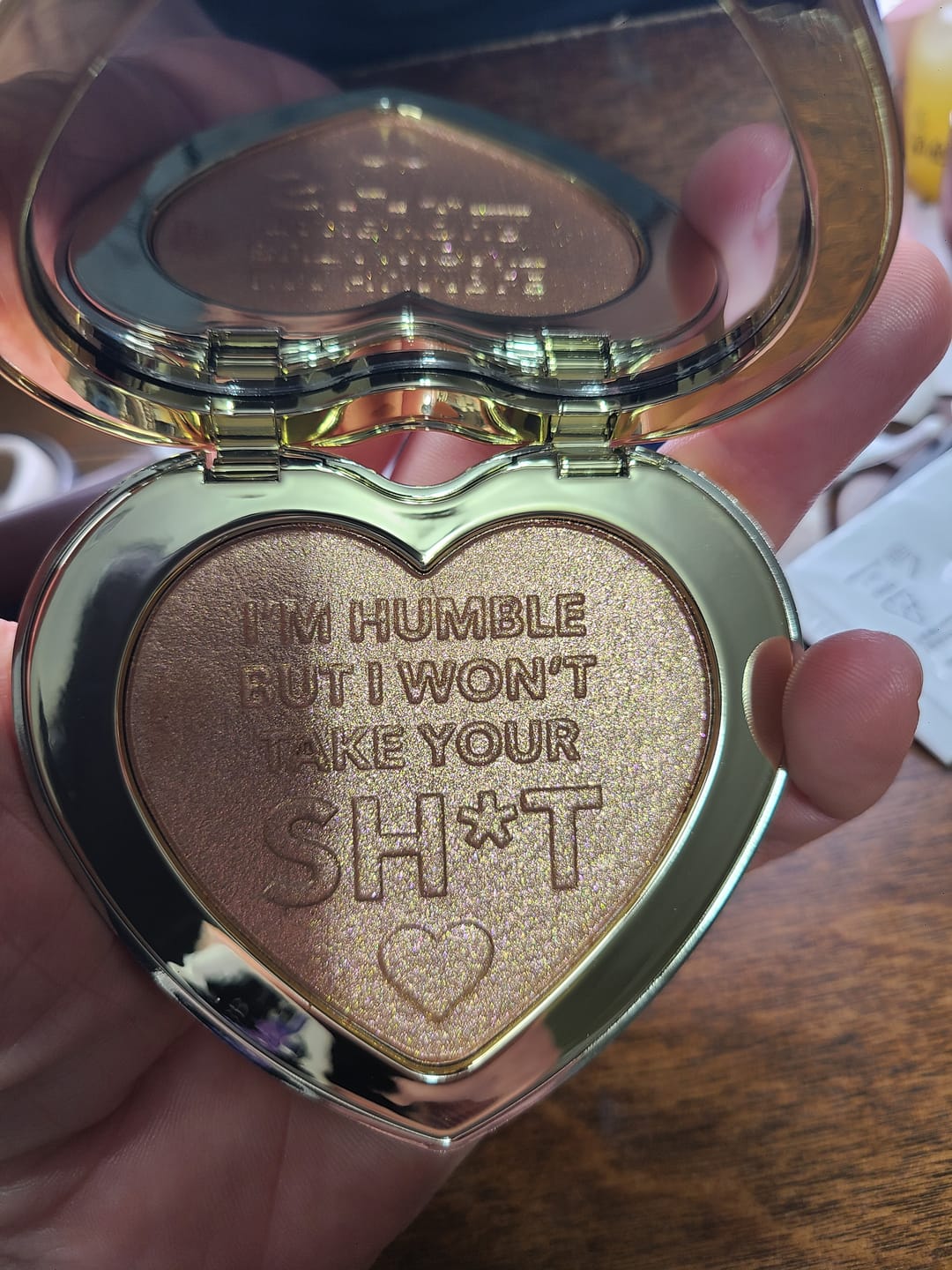 Customer photo review of Skin Bling Baked Highlighter Powder
