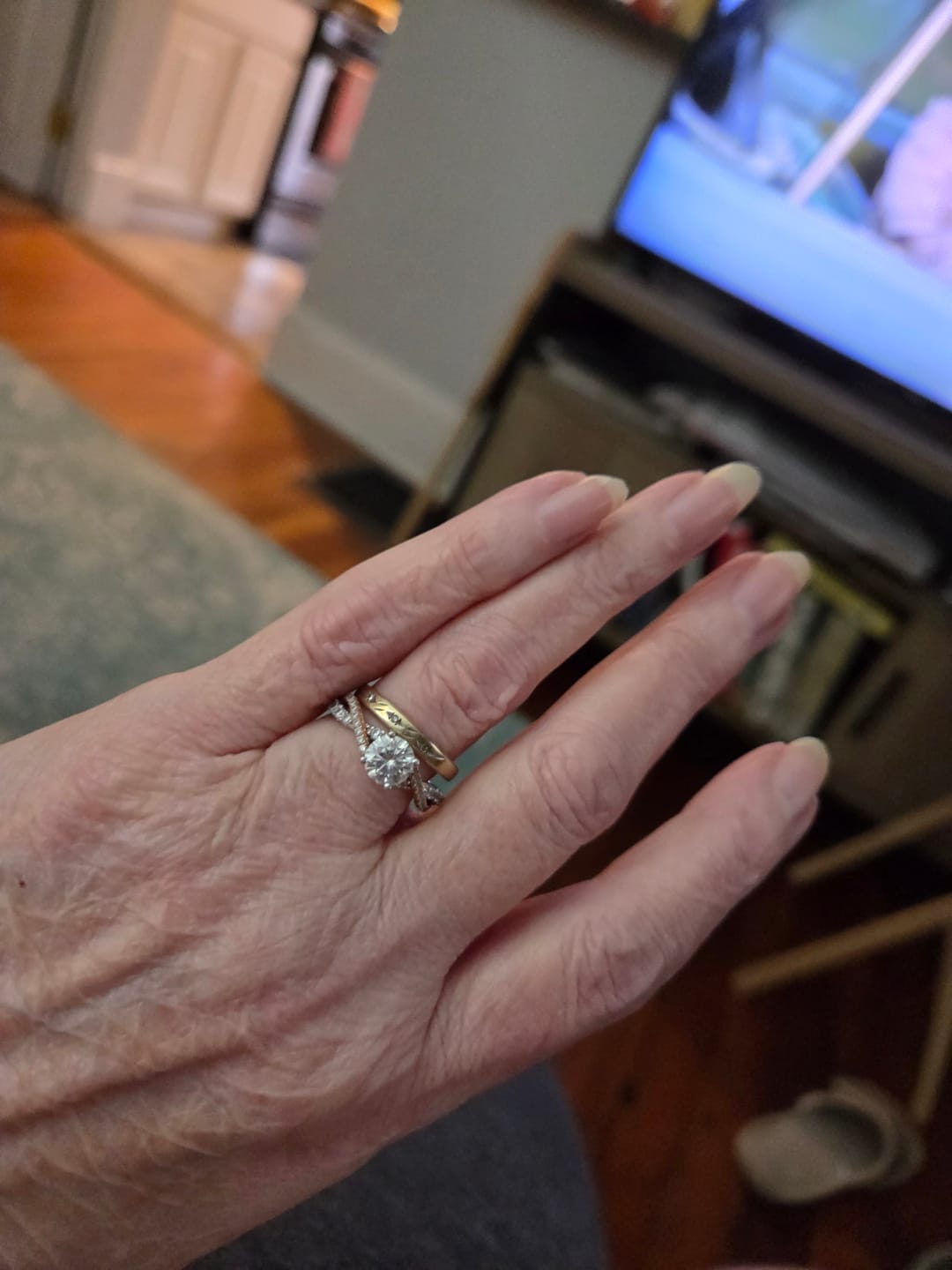 Customer photo review of Rose Gold Two Tone Moissanite Twisted Vine Pave Engagement Ring