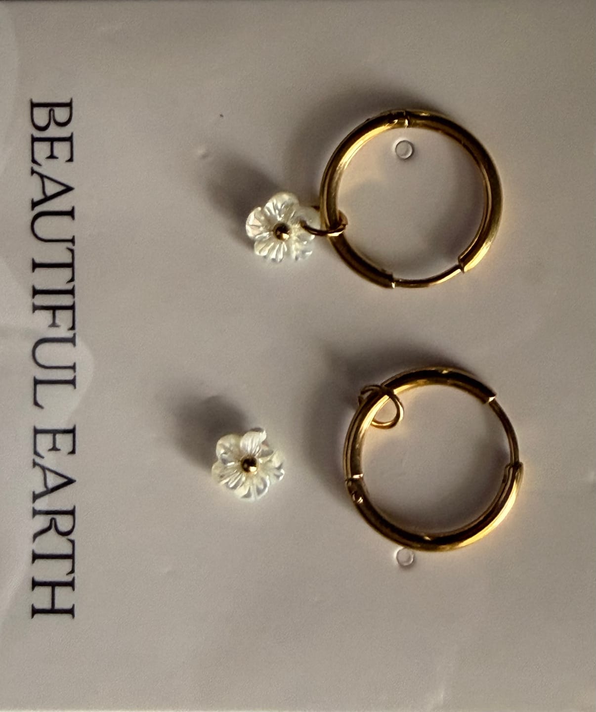 Customer photo review of White Petal Shell Hoop Earrings