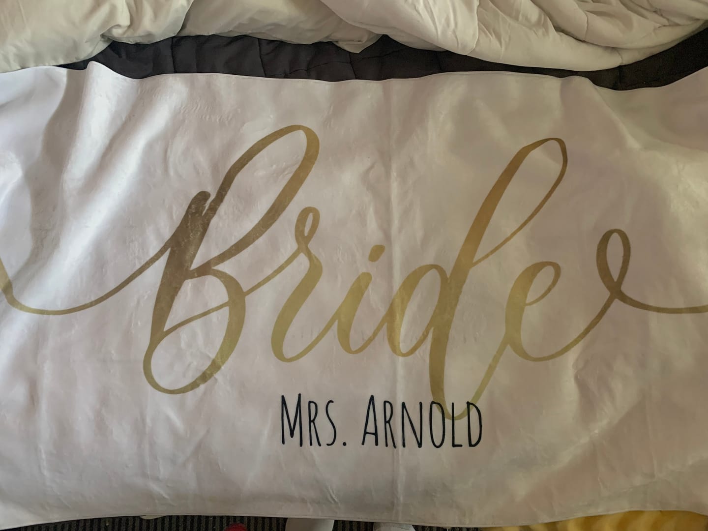 Customer photo review of Personalized Bride Beach Towel: Gold Confetti Honeymoon Gift
