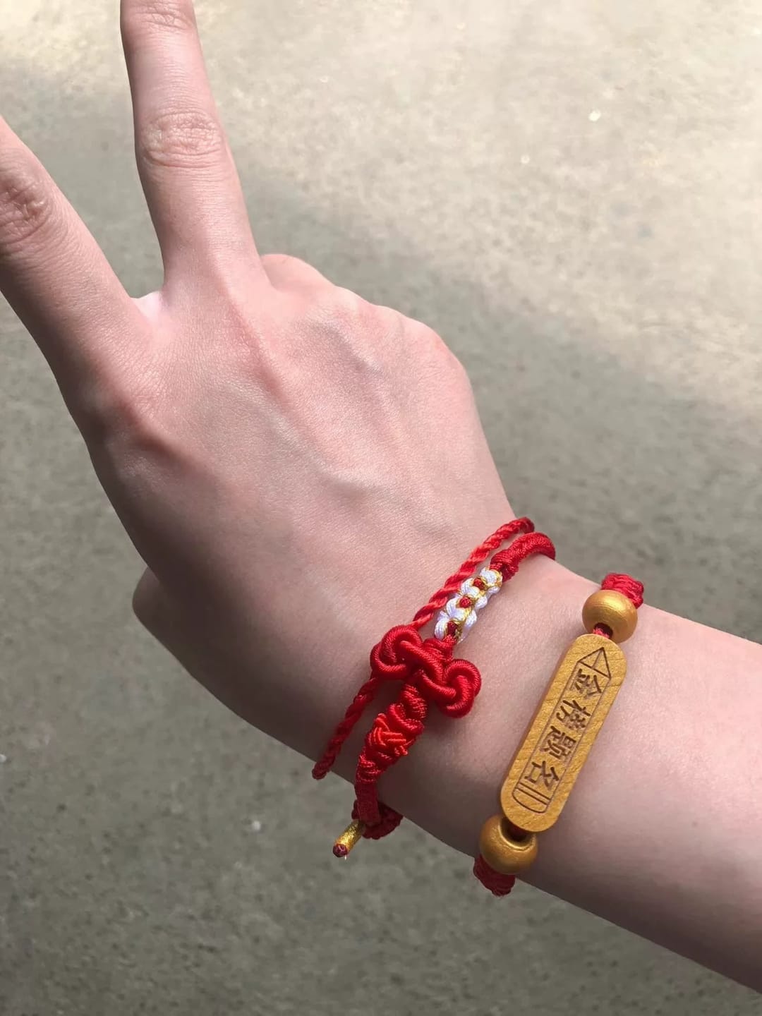 Customer photo review of FuAttract Good Luck Wisdom & Success Wenchang Knot Handmade Red String Bracelet