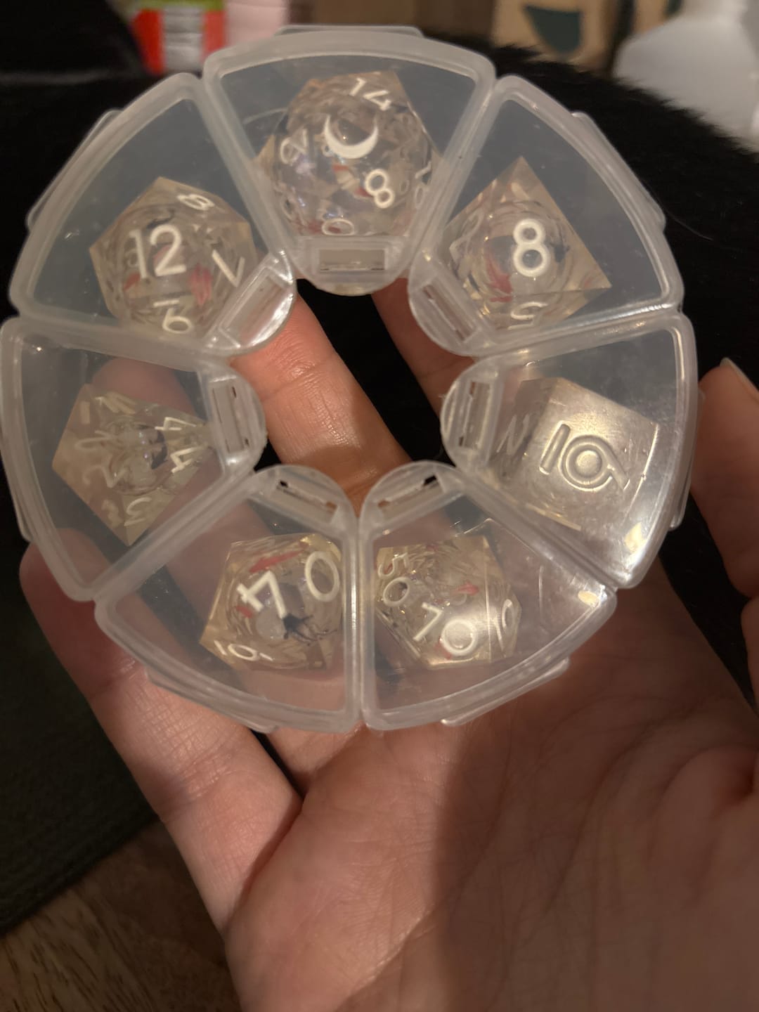 Customer photo review of URWizards D&D Starry Liquid Heart Resin Engraved Dice Set Koi Fish