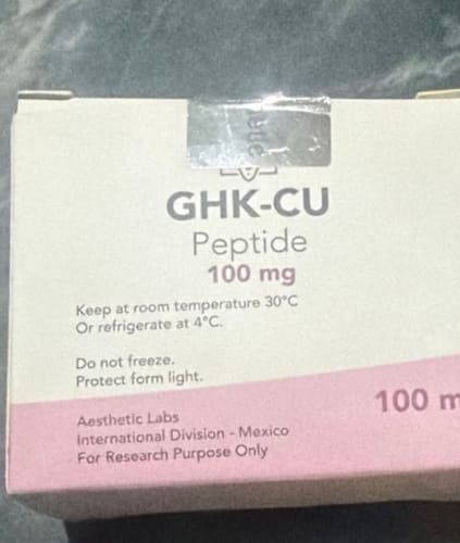 Customer's box of Aesthetic Labs GHK-CU peptide 100mg with visible storage and research purpose labels.
