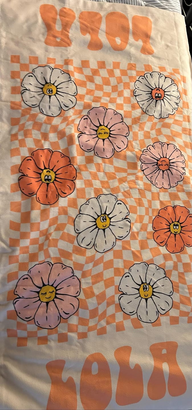 Customer photo review of Retro Floral Personalized Beach Towel: Custom Name Vacation Gift