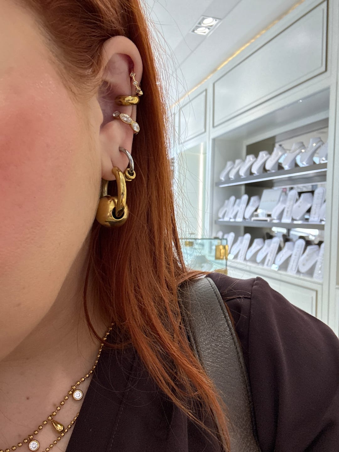 Customer photo review of Par Arracada Plateada Con Mini Aros Dorados