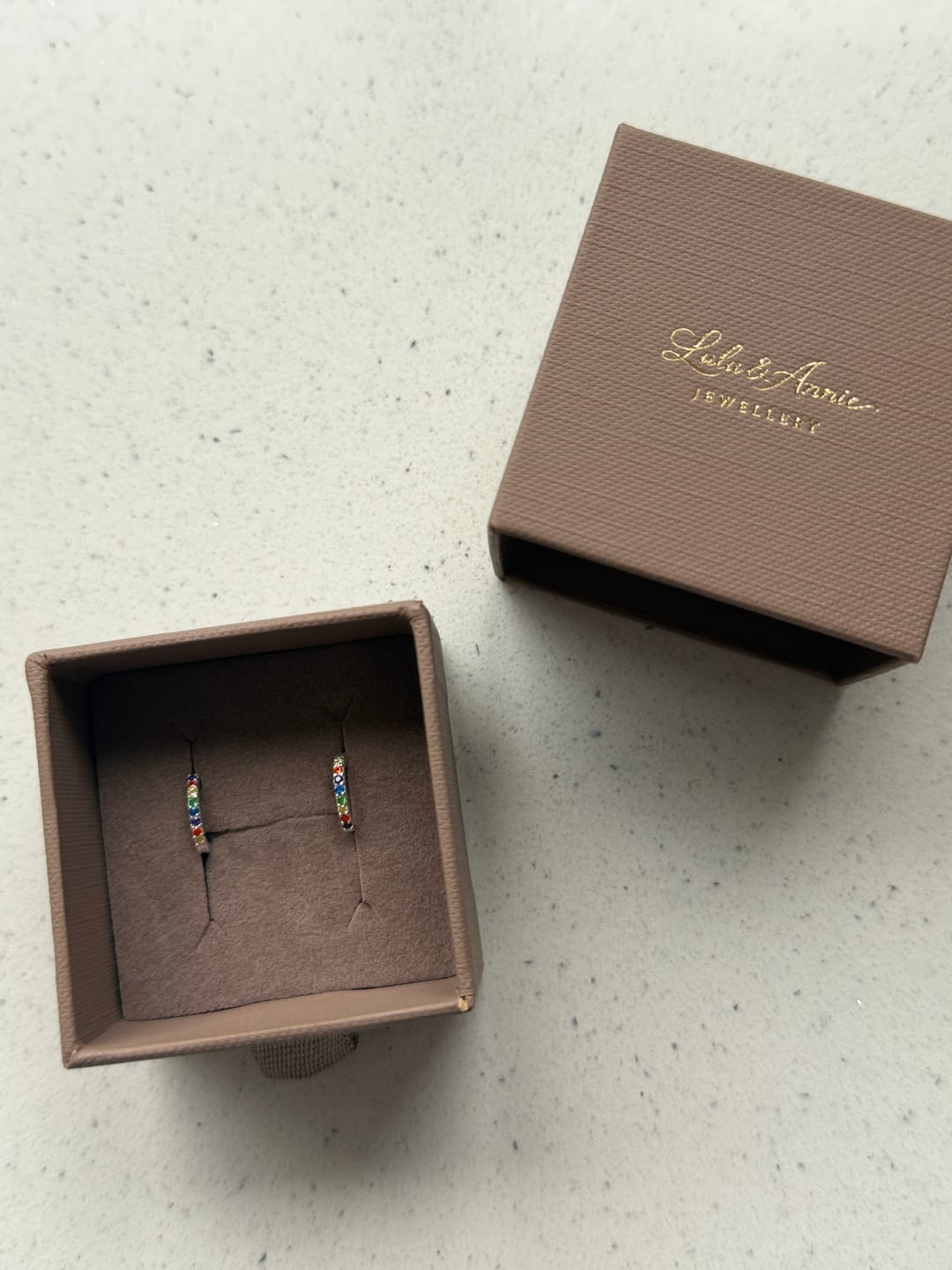 Customer photo review of Silver Rainbow Multicolour CZ Huggie Hoop Earrings