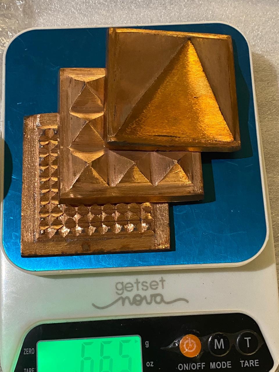 Customer photo review of 3-Layer Copper Pyramid Vastu Remedy for Energy Amplification, Prosperity and South East Direction Activation for Home, Office and Vastu Correction | 5-7.6 cm | 665 g