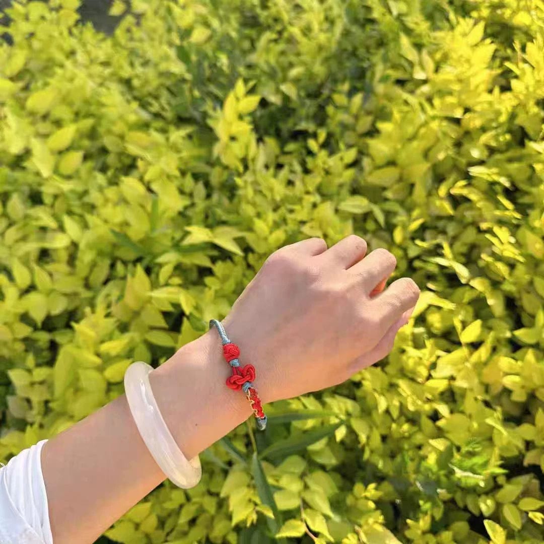 Customer photo review of FuAttract Good Luck Wisdom & Success Wenchang Knot Handmade Red String Bracelet