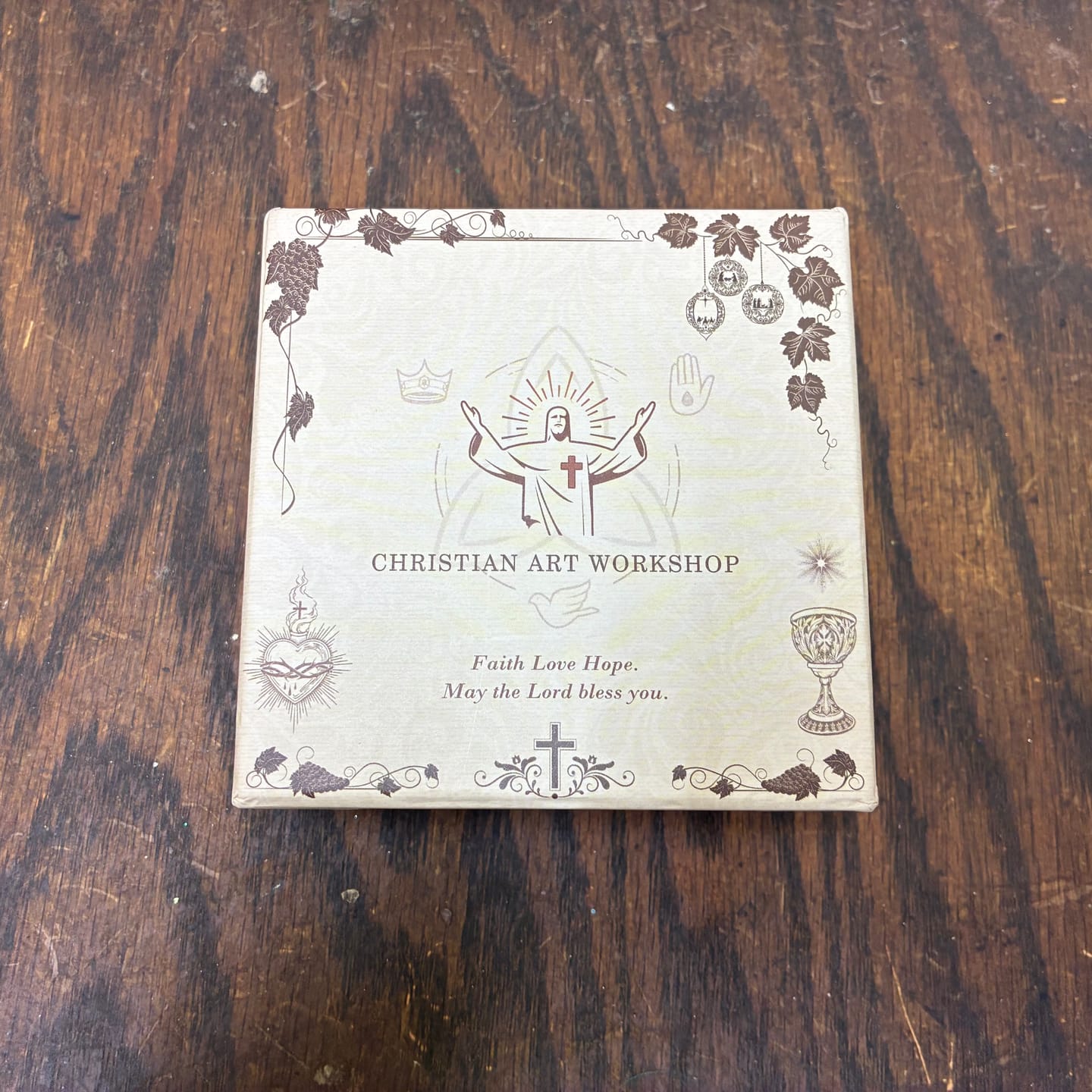 Customer photo review of Christianartworkshop Purple Wooden Rosary With Bronze Crucifix & Embossed Holy Family Medallion