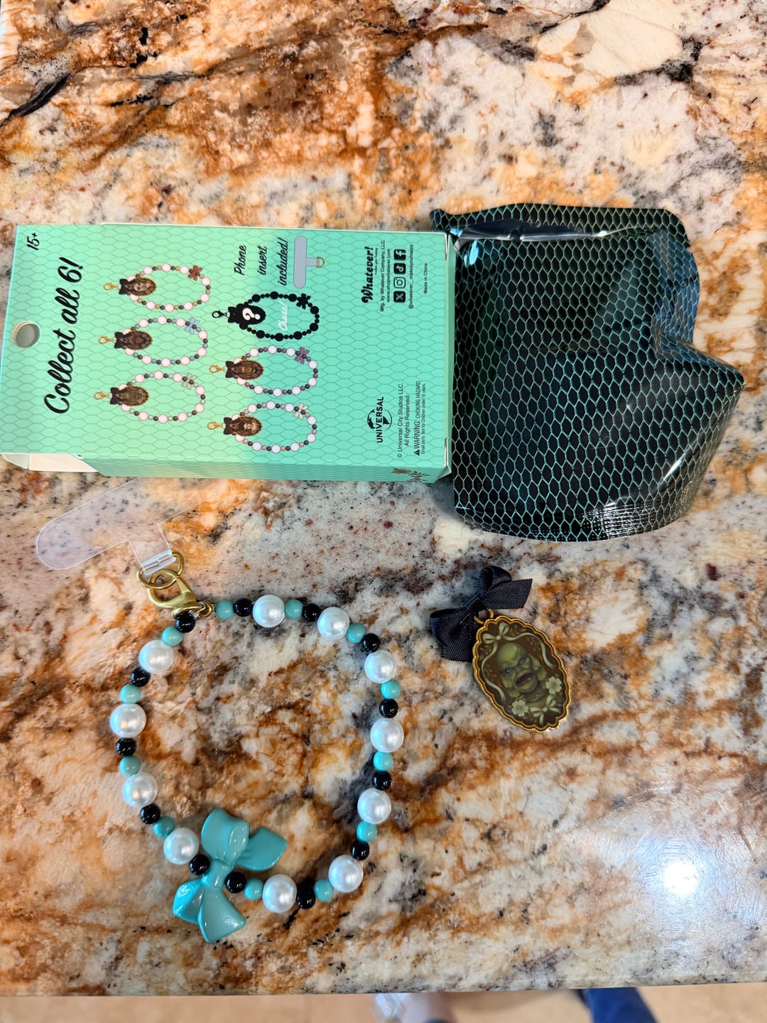 Customer photo review of Whatever Makes You Happy Universal Monsters Coquette Mystery Box Beaded Wristlet Phone Charms