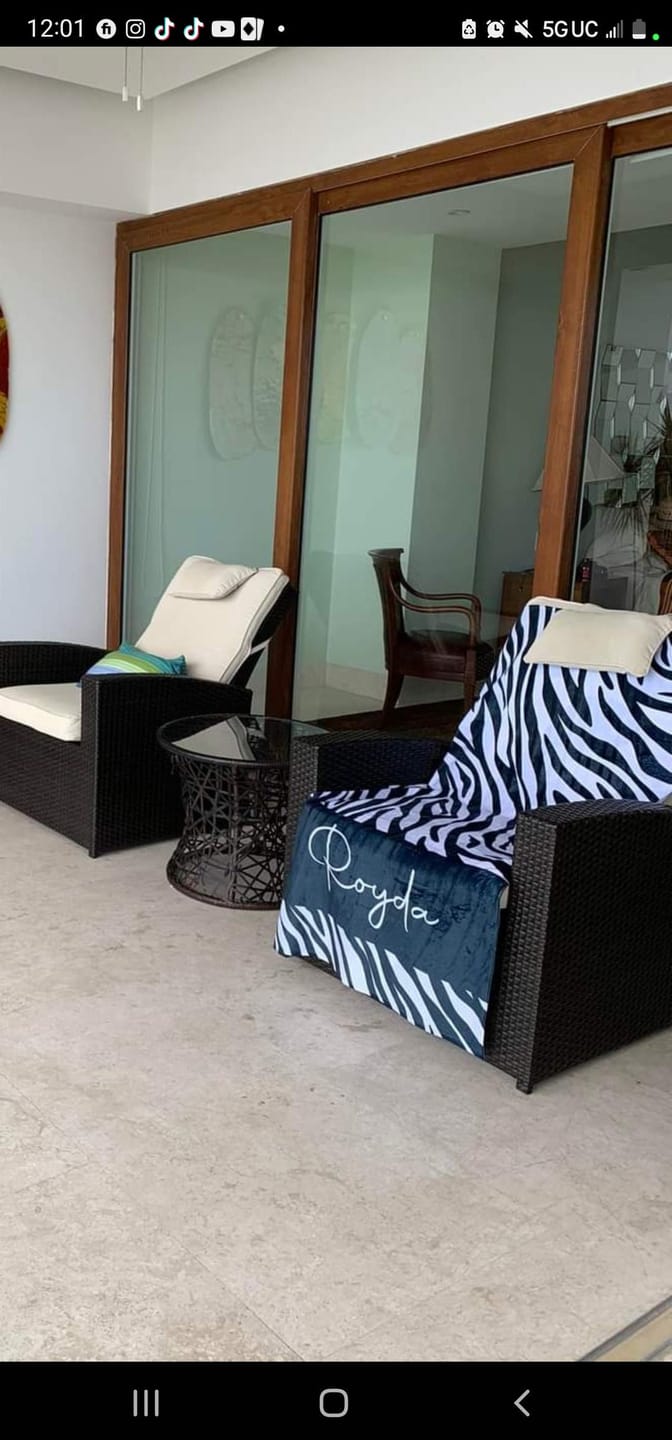 Customer photo review of Personalized Leopard Print Beach Towel: Custom Name Pool Towel