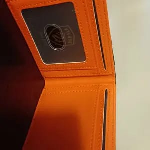 Customer photo review of Portafoglio Uomo Slim Bifold Pelle Minimalista Antigraffio RFID
