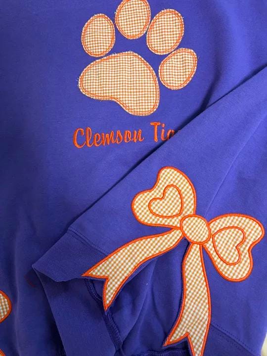 Customer photo review of Custom Tennessee Volunteers Women’s Team Spirit Sweatshirt – Applique Embroidered Side Bow Pullover