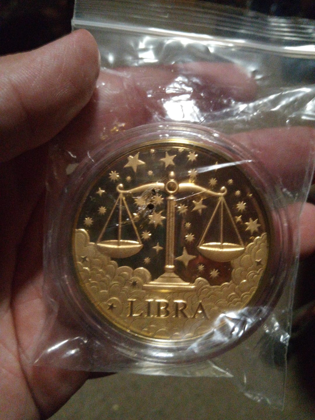 Customer photo review of 24K Yellow Gold (99.99% Gold Purity) Zodiac Sign Coin