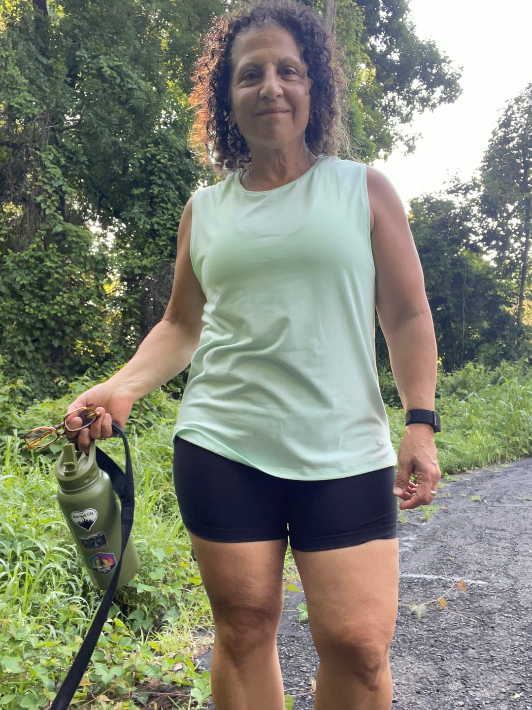 Customer photo review of Flowy Scoop Hem Muscle Tank