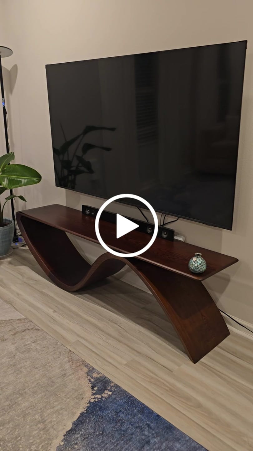 Customer video review of Sculptural Wave Natural Solid Wood TV Stand with Open Base Design