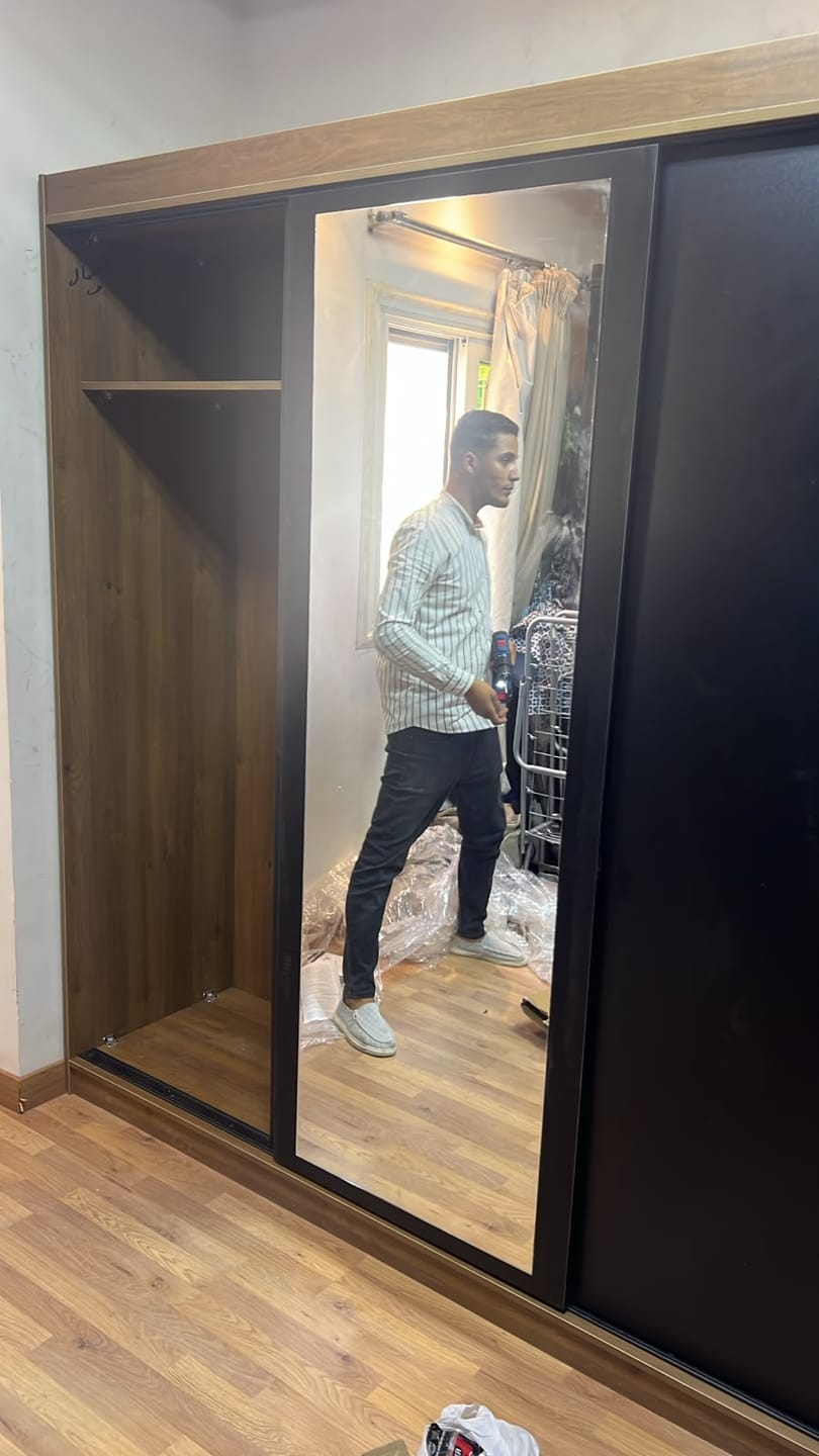 Customer photo review of Black and beige sliding wardrobe