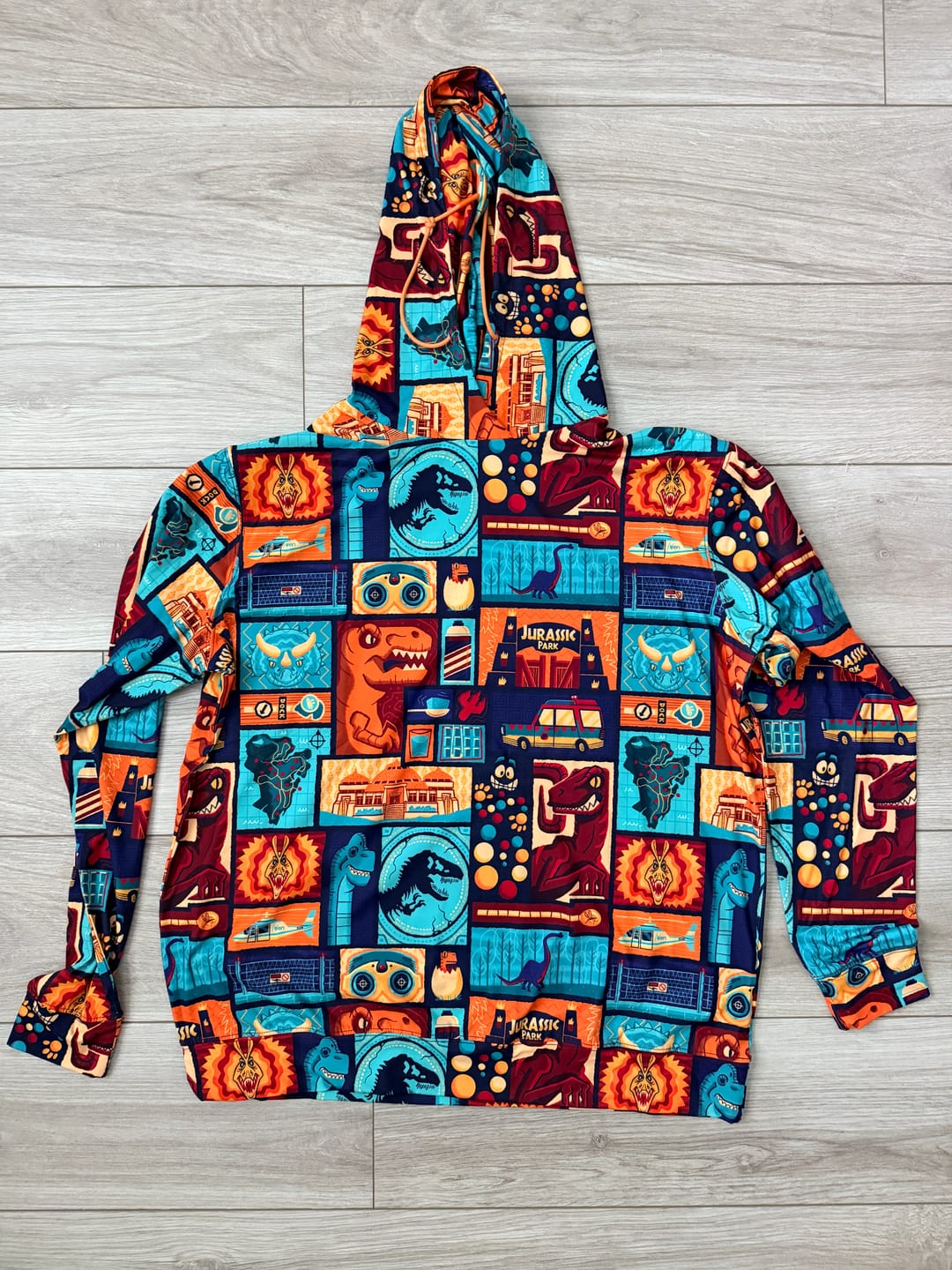 Customer photo review of Jurassic Park "Tiki Finds a Way" – Performance Hoodie