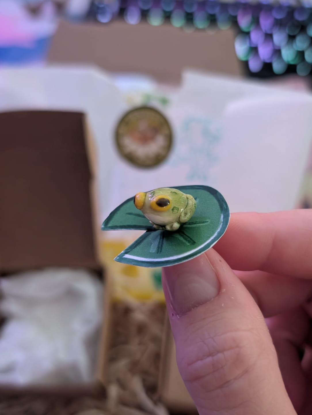 Customer photo review of green Frog and brown Toad Pin