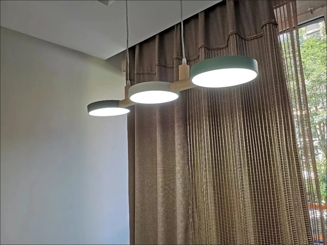 Customer photo review of Round LED Pendant Light In Iron And Wood, Adjustable Hanging Cable