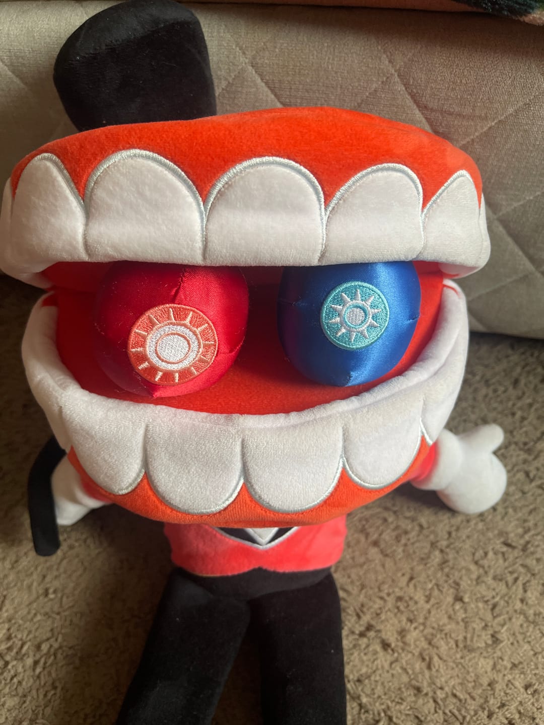 Customer photo review of Caine Puppet Plush