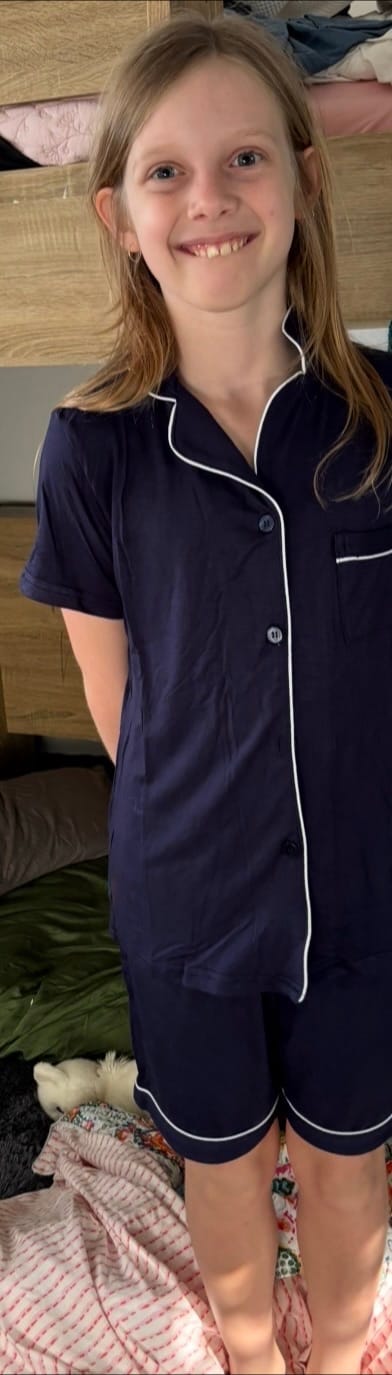 Customer photo review of Navy Blue Bamboo Sleeps Kids PJs – The Theo Set