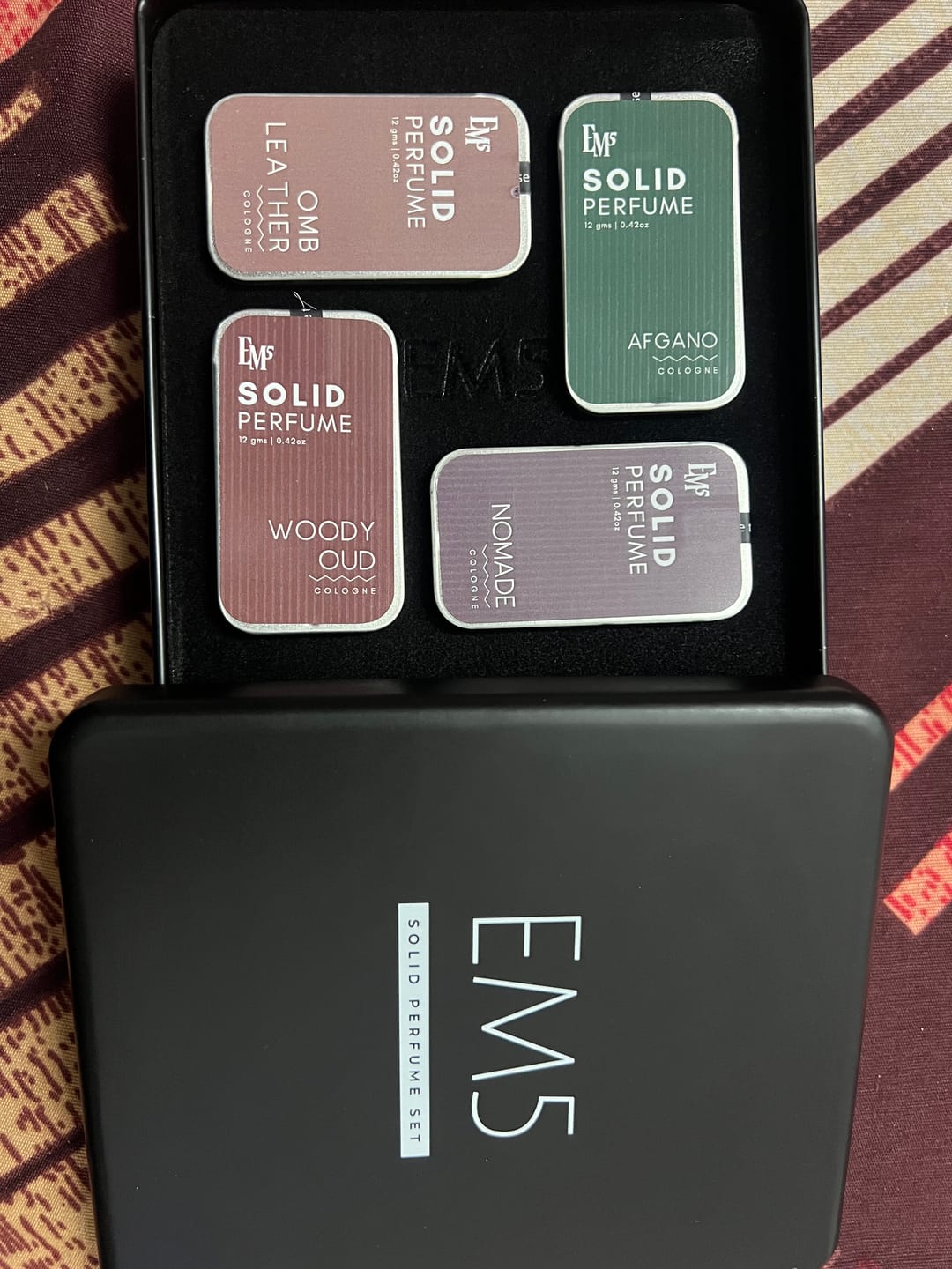 Customer photo review of Masculine Set of 4 Solid Perfumes