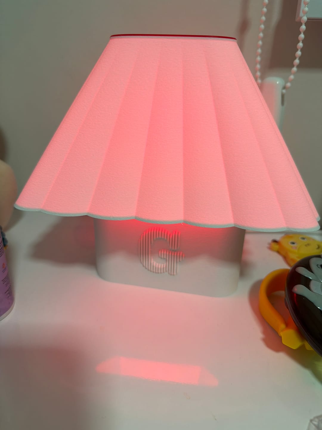 Customer photo review of Luminária Acalanto - Tecnologia SleepWave™ com Luz Vermelha