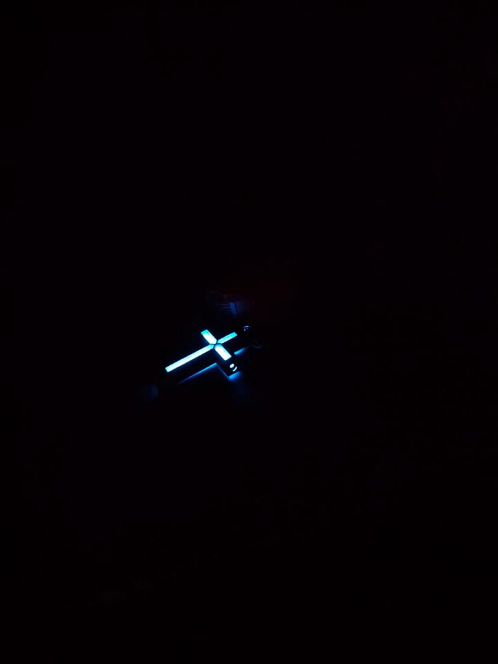 Customer photo review of Cyber Tritium Cross Pendant