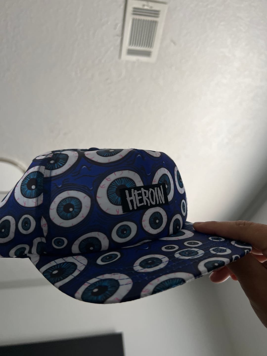 Customer photo review of HEROIN SKATEBOARDS EYES BLUE SNAPBACK HAT