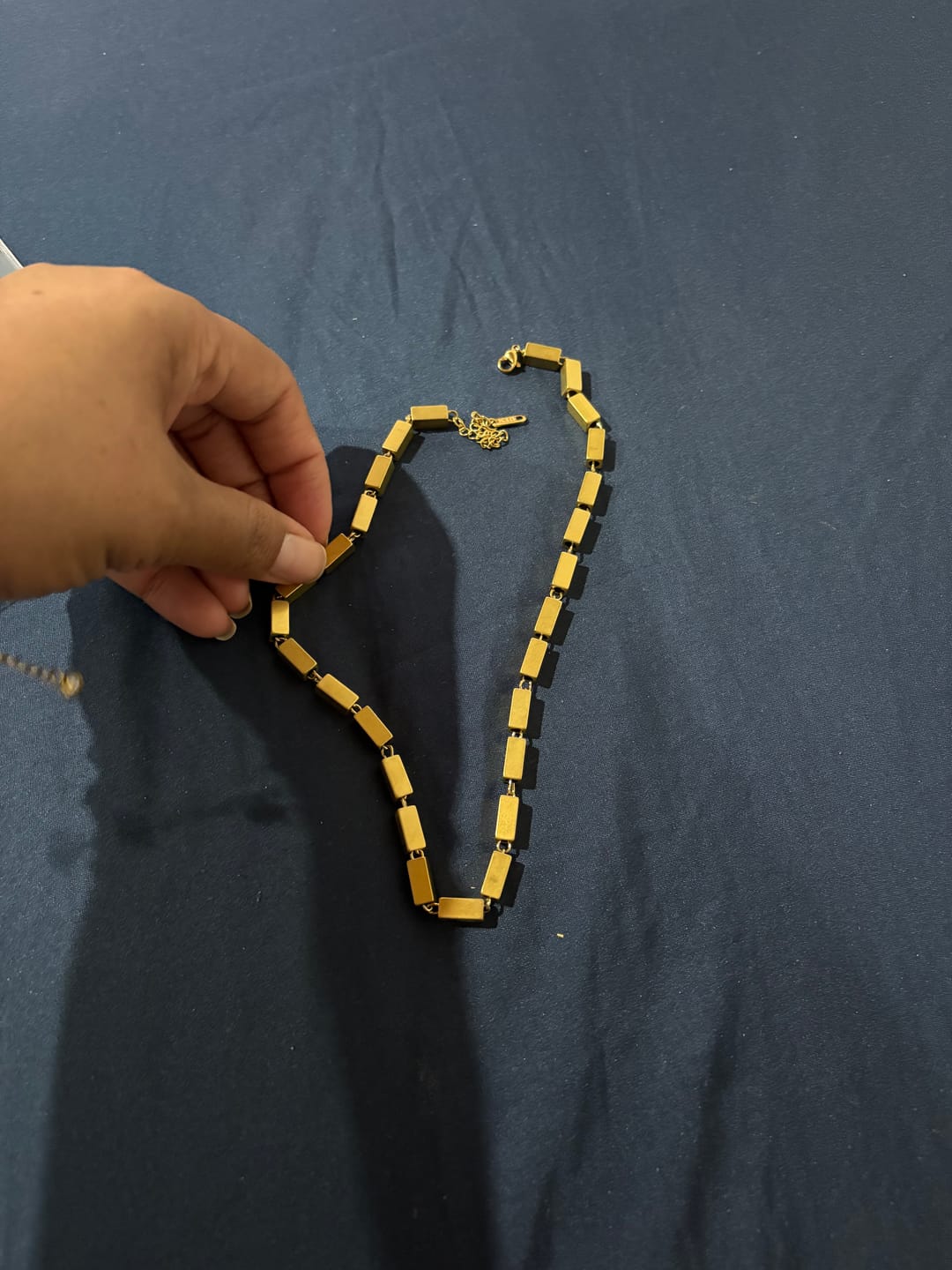 Customer photo review of Colar Cora Banhado em Ouro 18k