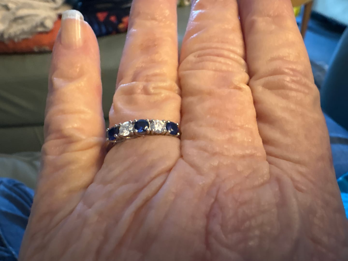 Customer photo review of Five Stone Moissanite and Sapphire Wedding Band Ring In Sterling Silver