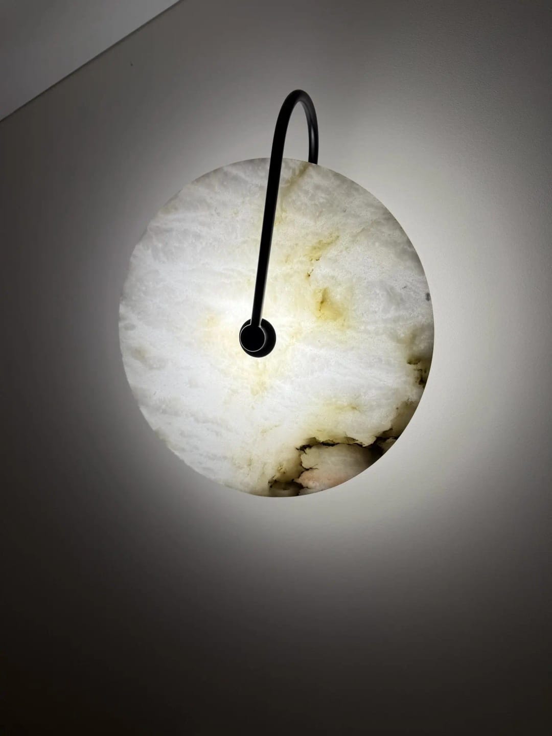 Customer photo review of Kristy Round Alabaster Wall Lamp, Black Arm, G9 LED, Warm or Cold Light