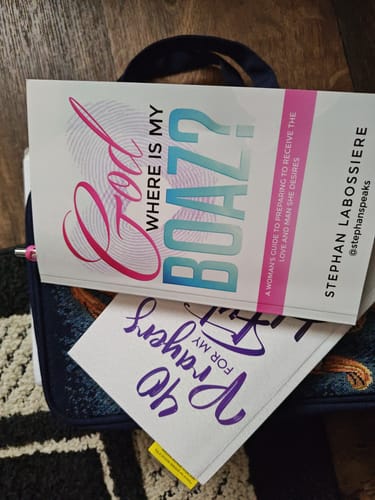 Customer's Receiving The RIGHT MAN Bundle books, including God Where is My Boaz, resting on a bag.