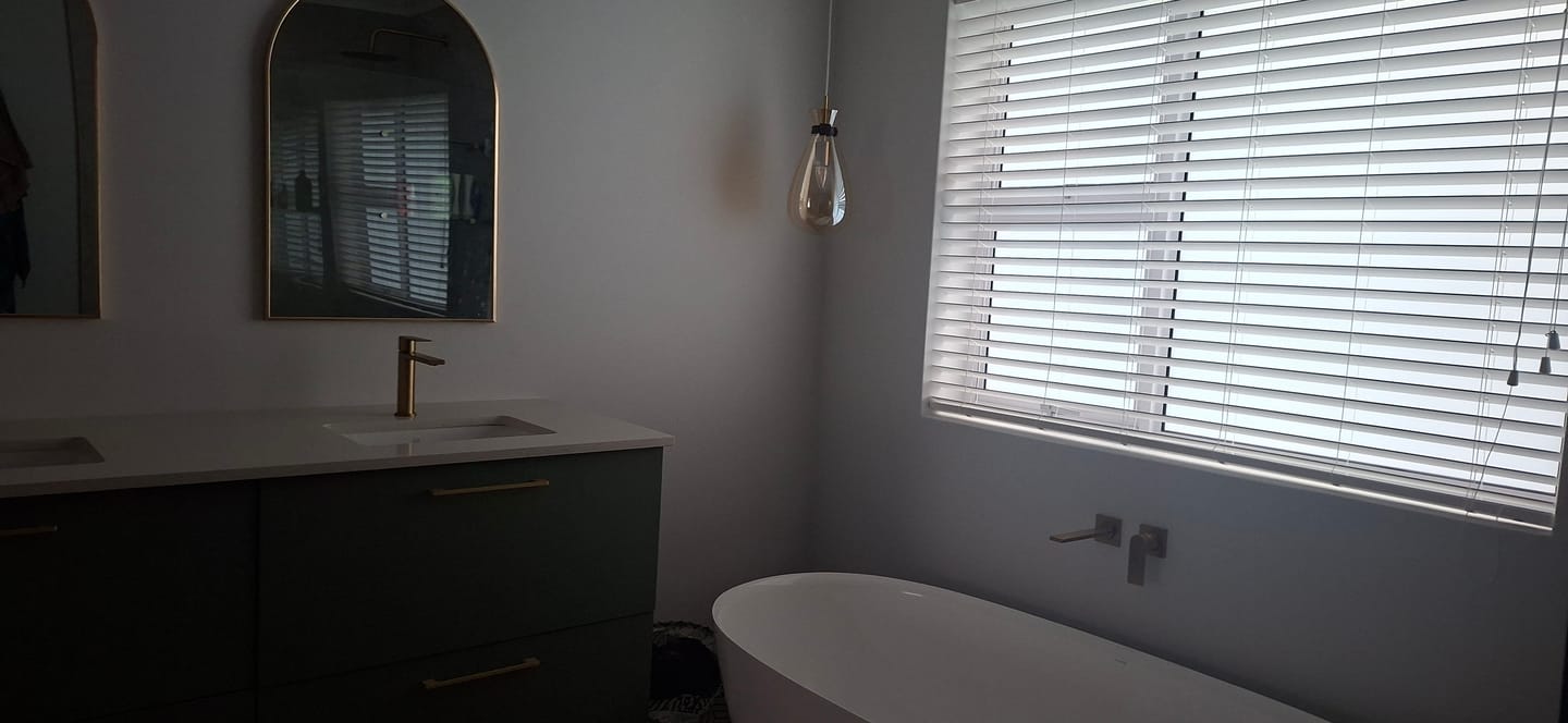 Customer photo review of Arched Metal Wall Mirror for Bathroom and Entryway - Gold | Black