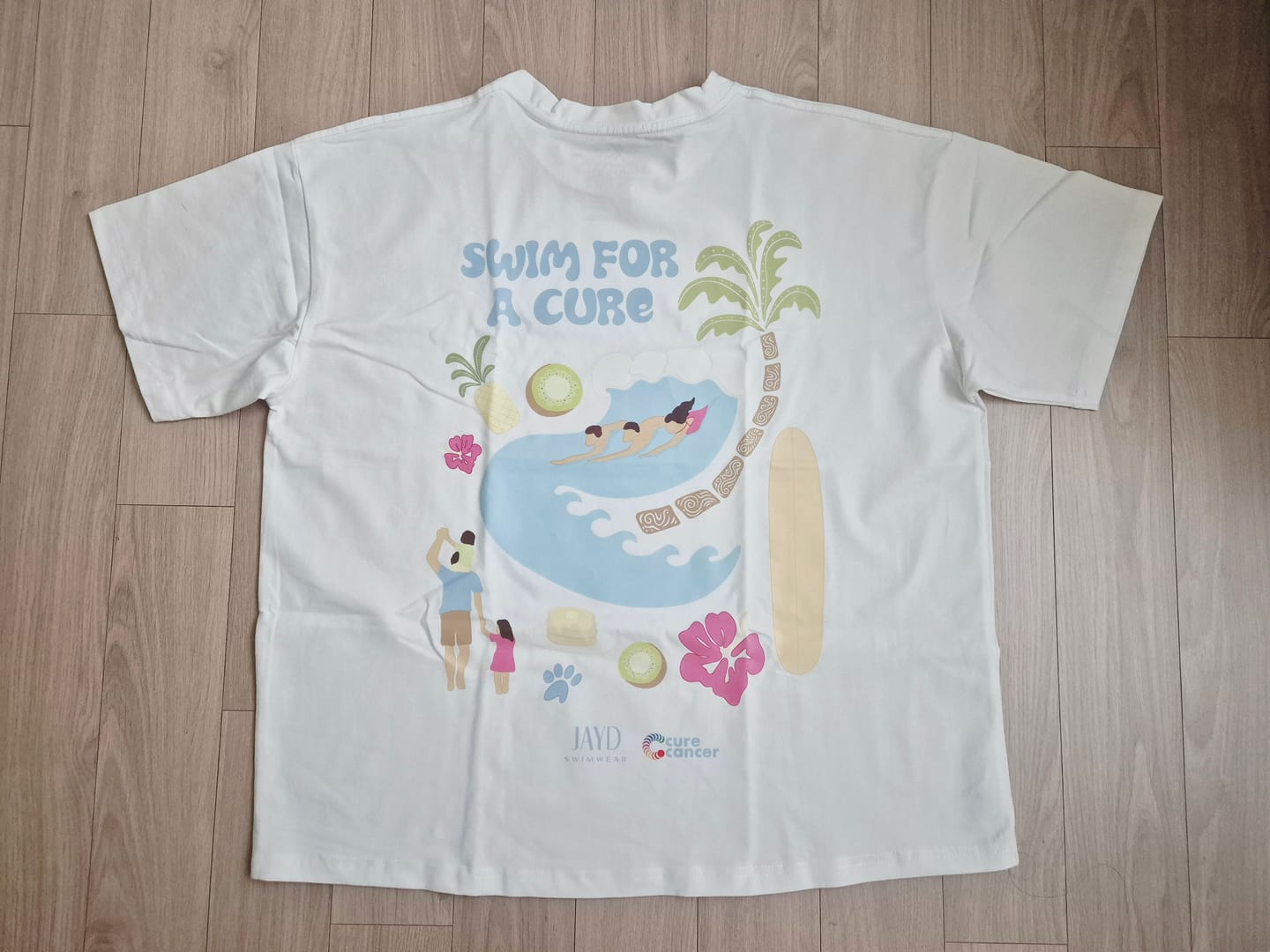 Customer photo review of SWIM FOR A CURE Tee